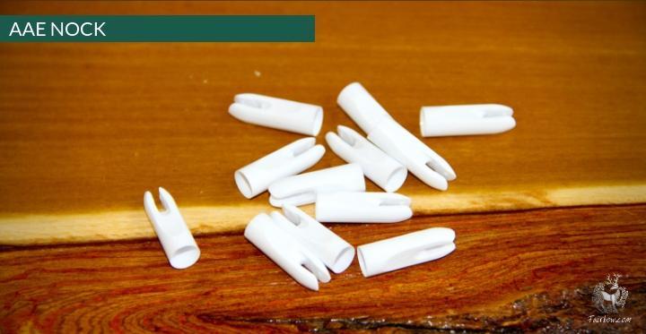 PLASTIC NOCKS 1/4 INCH AAE PER DOZEN-Nock-Fairbow-Black-Fairbow