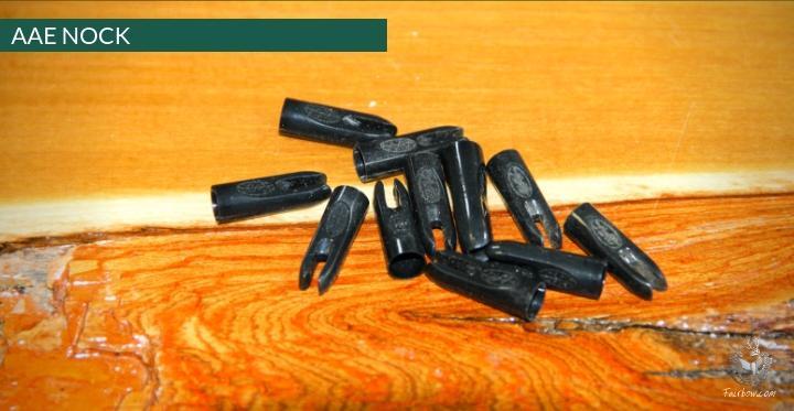 PLASTIC NOCKS 1/4 INCH AAE PER DOZEN-Nock-Fairbow-Black-Fairbow